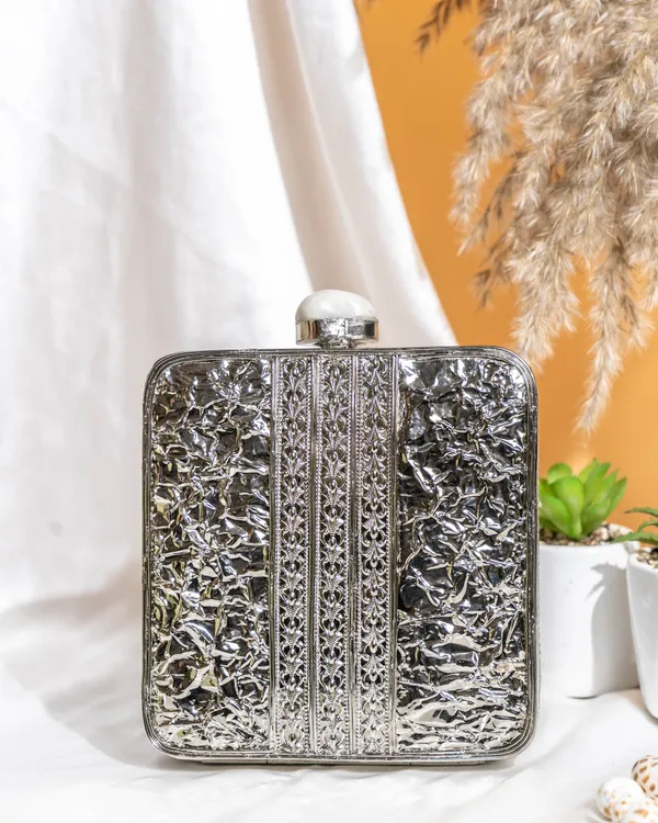 Kaia_Raw_Shell_Metal_Clutch